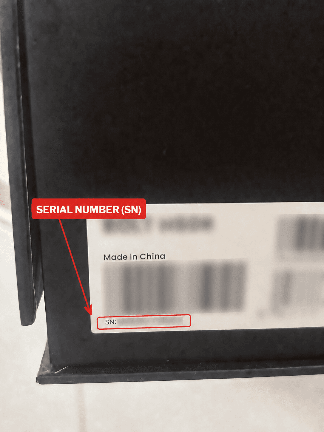 Product label showing where to find the serial number, with the example number obscured